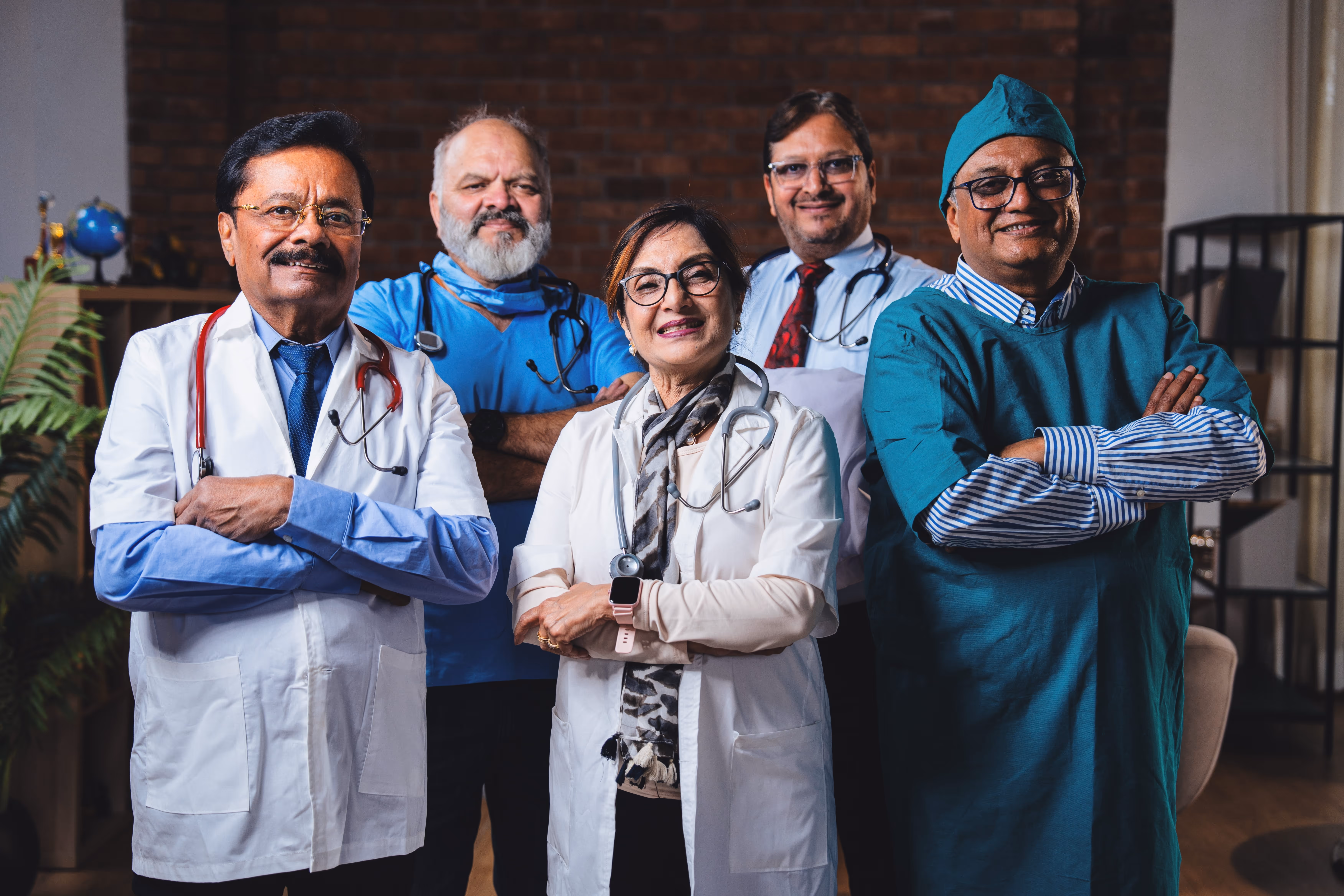A team of doctors take a group photo